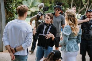 Director Hayley MacFarlane on set 