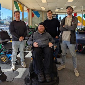 Members of Broadside Games and their co-design group at Move Mobility in Logan